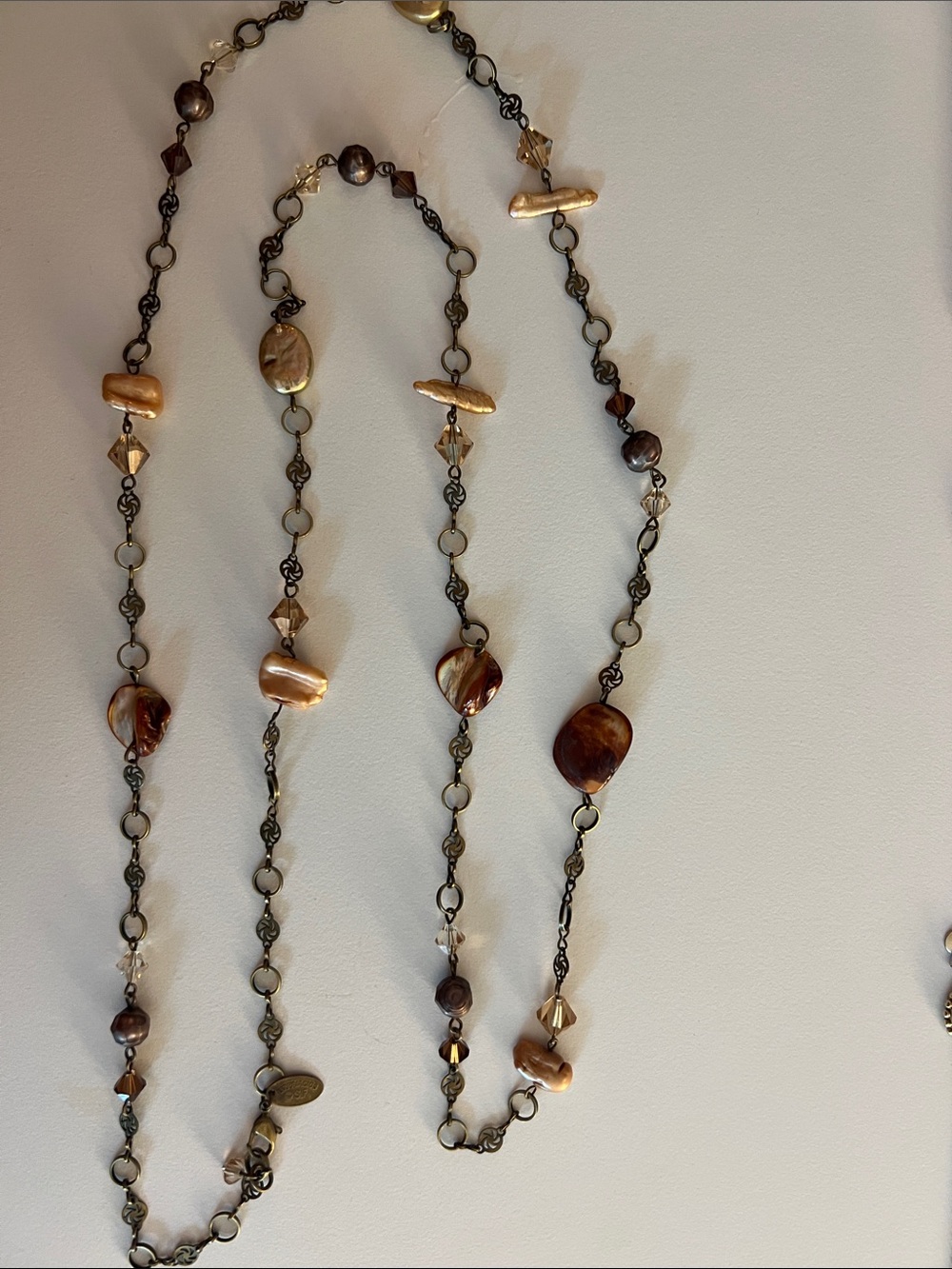 Liz Palacio SF station necklaces with mother of pearl